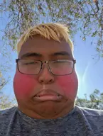 black_skin blonde_hair blush character:hunky character:vinluv closed_mouth glasses hsmt irl nate nate_higger's_distant_cousin_(cape_rrackers) subvariant:hunky_twink_sex_machine // 880x1168 // 296KB